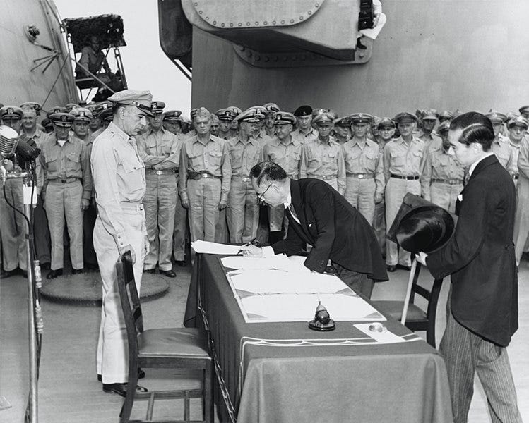 Historical image depicting the signing of the surrender