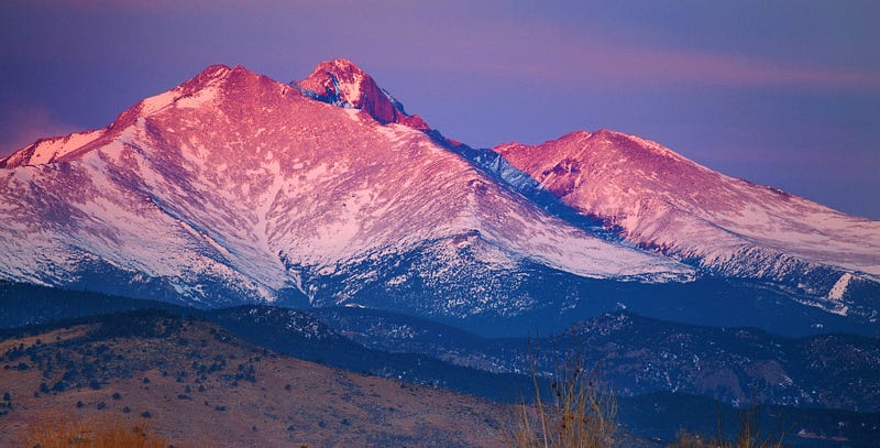 Majestic mountains bathed in alpenglow