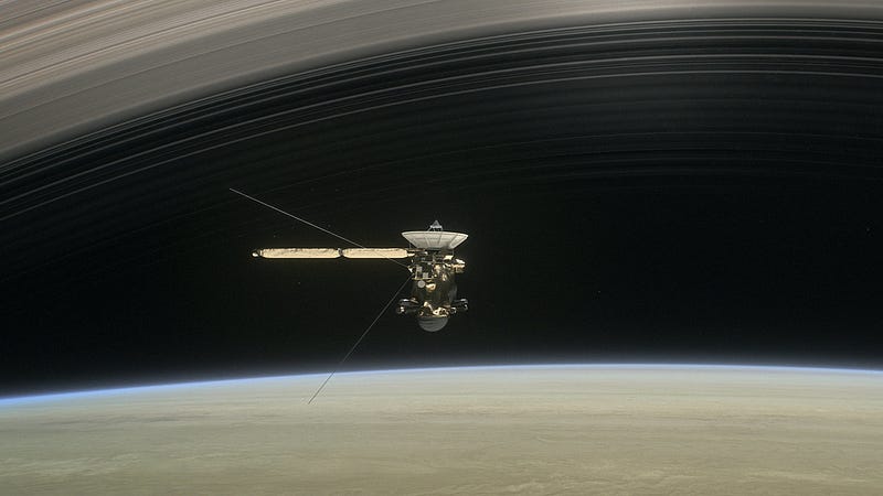 Artist conception of the Cassini space probe diving between Saturn and its innermost ring.