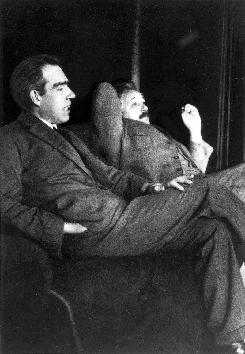 Bohr and Einstein discussing quantum mechanics